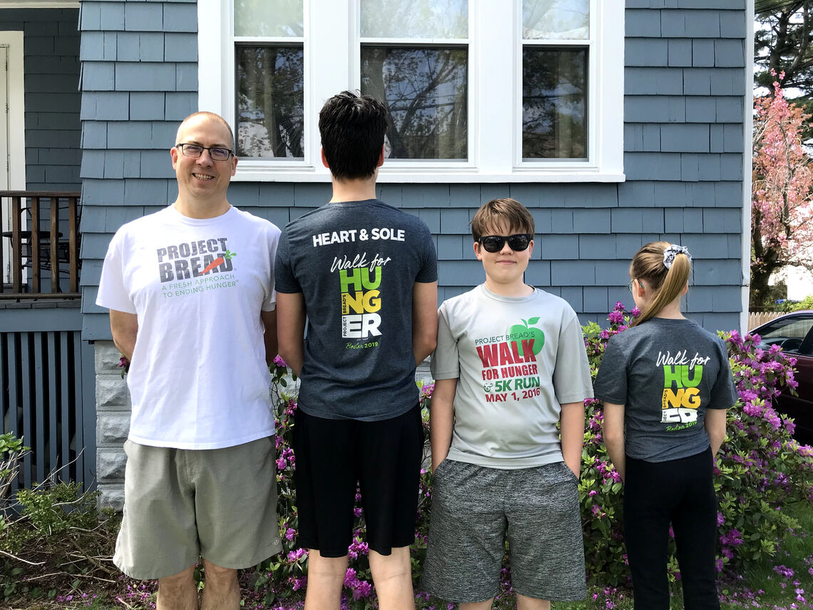 The Cluggish Family models their collection of walk tee shirts at the virtual Walk for Hunger in 2020
