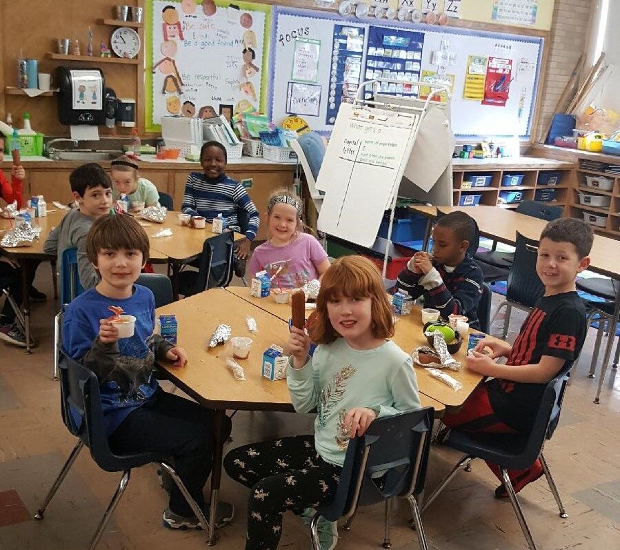 Elementary school students at breakfast