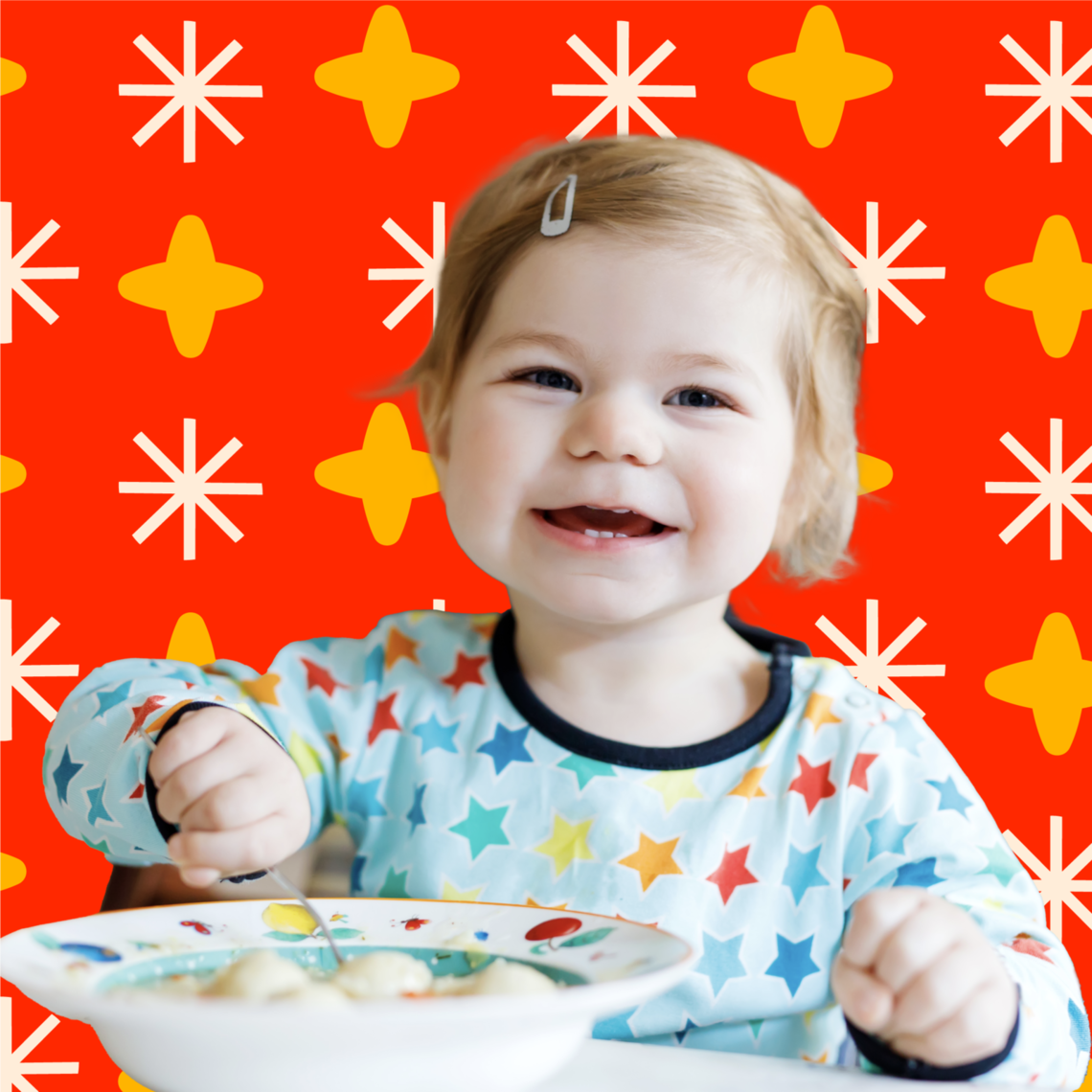 Toddler eating a bowl of cereal smiling in front of a project bread red and star background