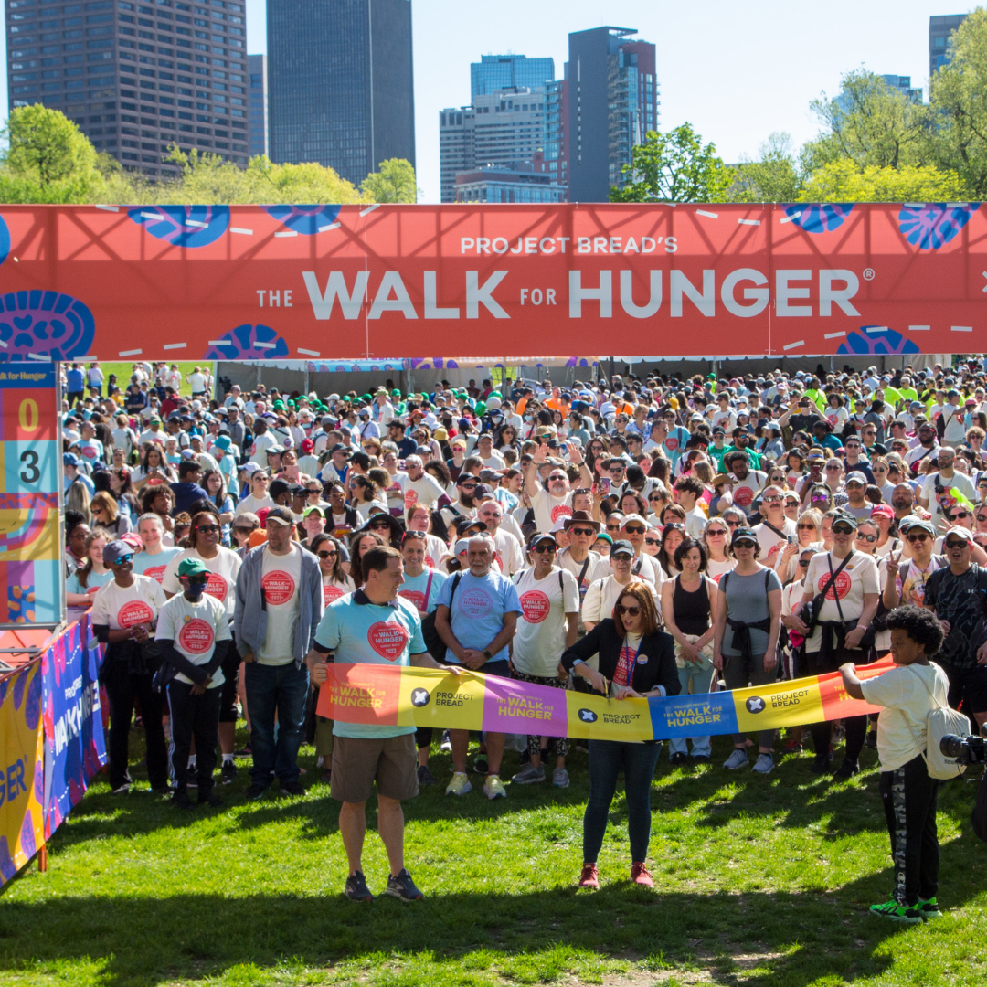 A crowd of people waits at the starting line of The 2023 Walk for Hunger on Boston Common